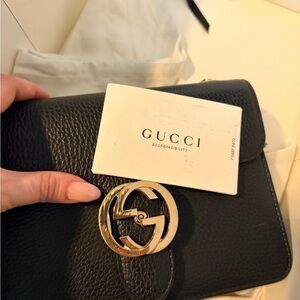 Gucci Black Leather Clutch with Gold Accent
